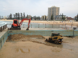 Wright Earthmoving nsw Pic 2 - Cleaning sand out of the rock pool at manly