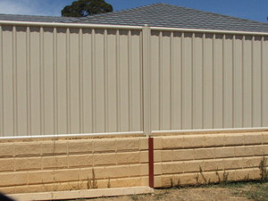 Town & Country Maintenance & Fencing Pic 5 - Good Neighbor fencing on top of retaining wall