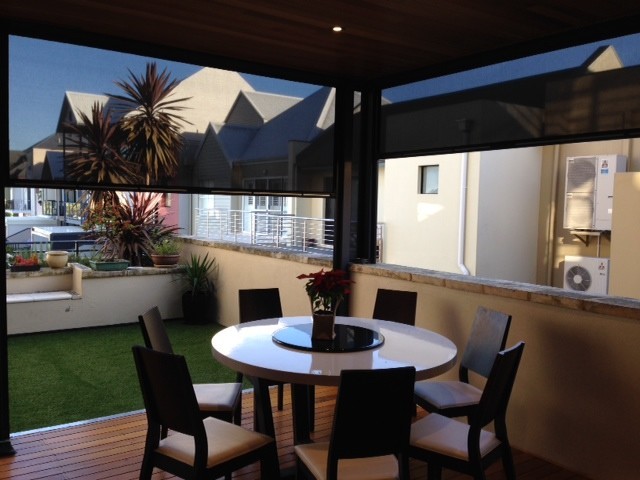 Perth Vinyl Welding Pic 1 - Ziptrak blinds installed on an outdoor balcony