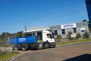 Vinsbins Pic 4 - a driver leaving for a job with our office in the background