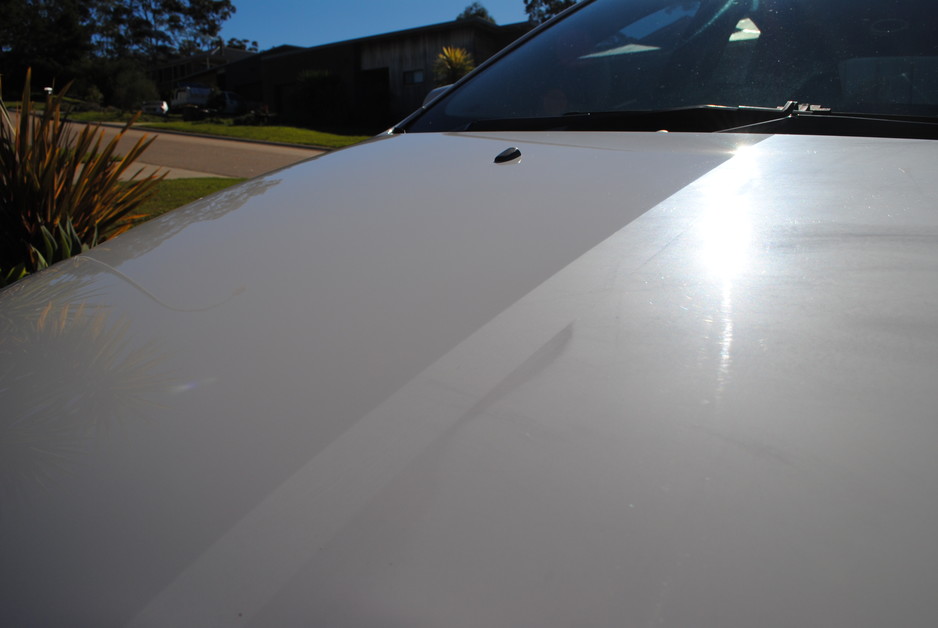 Revived Reflections Automotive Detailing Pic 2 - Before an after of a severely neglected Ford Focus