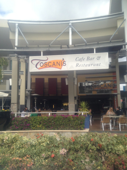 Toscani's Cafe Bar & Restaurant Pic 1 - From central courtyard near fountain Play area public here for kids looked new and fun