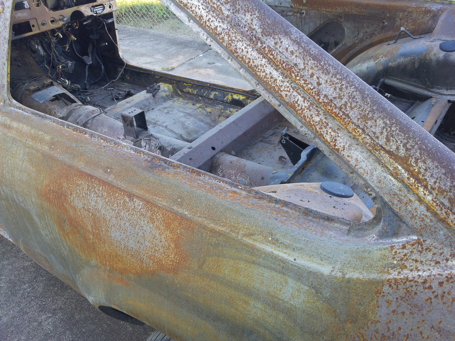 Odin Coatings - Mobile Dustless Blasting Pic 1 - Super rusty car caught in the rain after being Soda blasted