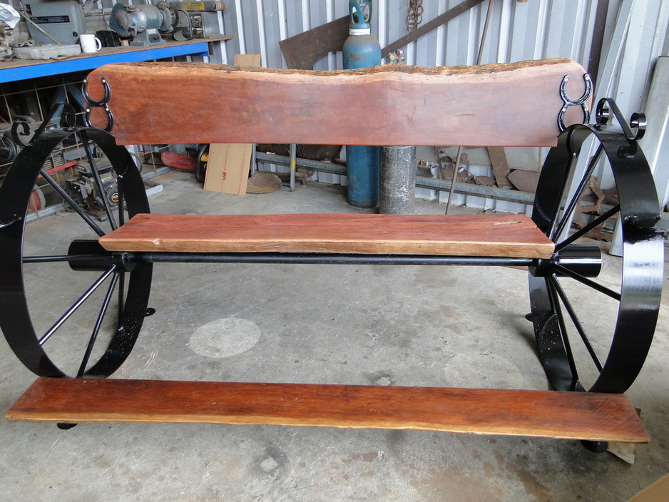 N & J Small Engines & Rustic Works Pic 1 - Western style wagon wheel seats made to order