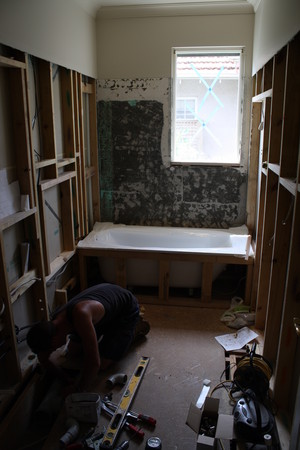 Newham Tiling Pic 2 - Bathroom renovation before We do all preparation work including demoltion cement sheet lining plastering rendering bath frames in wall niches waterproofing