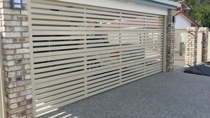 All Coast Garage Doors Pic 4 - Custom Slatted sectional door