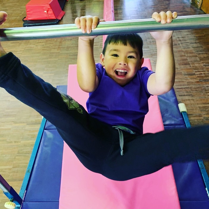 Gymnastics 21 Pic 1 - Hanging like a bat in our Kinder Gym class