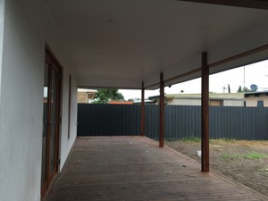 Cityside Renovators Pic 4 - Continued the roof out onto the spotted gum decking with a plaster ceiling finish