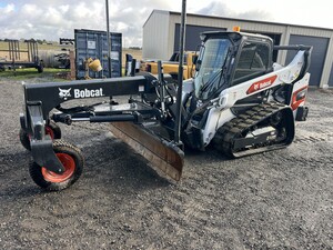 Walkers Earthworx (Vic) Pty Ltd Pic 5 - Positrack with 4 in one bucket smudge bar grader attachment and dual grade laser control