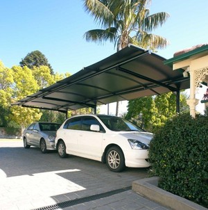 Outrigger Awnings & Sails Pic 5 - Cantilevered Carport Awning the most practical carport solution