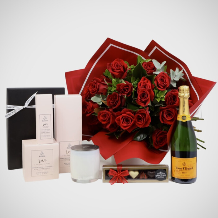 STYLE AND BLOOMS Pic 1 - The ultimate gift Red Roses Urban Rituelle gifts Belgium Delight Chocs and a bottle of Veuve