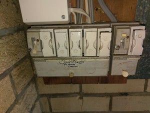 Phaseshift Solutions Pic 2 - Old ceramic fuse switchboard before being upgraded