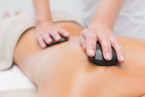 Temple Day Spa Pic 4 - Hot Stone Massage is a signature treatment at Temple Day Spa