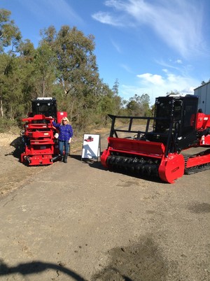 Reeper Mulching Pic 2 - Tree shear on the left and to the right is the fecon 128 mulcher