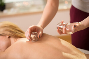 Aromae Massage Pic 2 - Cupping is used to rid pain and unwanted toxins from the facia helps with muscular tension and cellulite weight loss