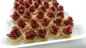 Cakebread Catering Pic 2 - From our catering Menu Rare Roast Beef Toasts with Roasted Tomato Chutney