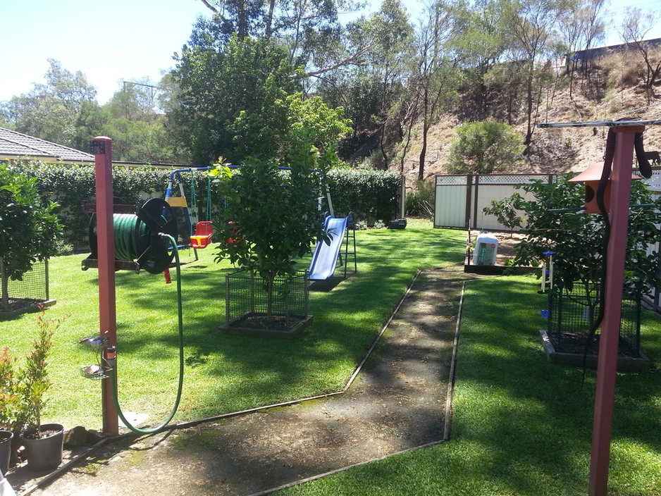 Razor sharp mowing & acreage services Pic 2 - Back Yard