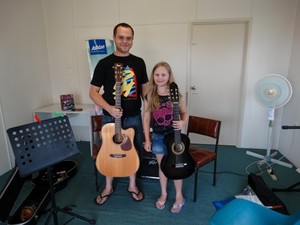 Gusto Guitars Pic 3 - Angus and Ella enjoying a lesson