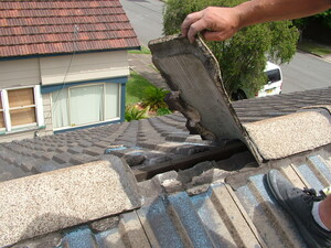 Roof Restoration Masters Pic 4 - Rebed Loose ridge capping