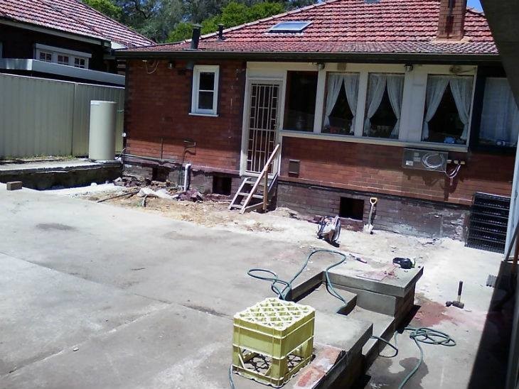 builder Sydney Pic 1 - Tempoary services reconnected Brick piers and hardwood floor framing in