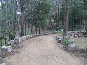 PD Landscaping Pic 5 - Man made lake and rock edging