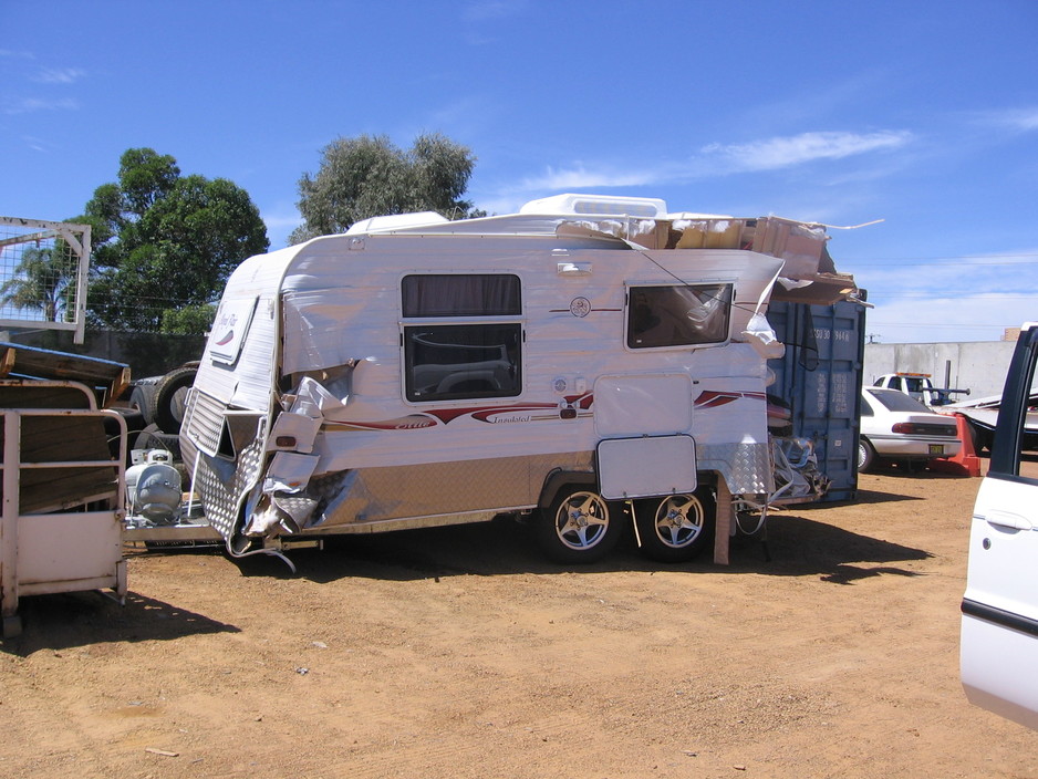 Freedom Caravans Pic 1 - One of our vans heavily damaged on the way to our old yard but we were able to bring her back to life