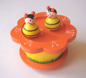 Cool Party Bags Pic 2 - Wind up the music box and watch the bees dance There is a magnetic feature which makes the figures waltz Many different animals are available in many colours