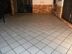 A'Court Concreting Pty Ltd Pic 5 - Patio Stencil in black grout lines and white tiles