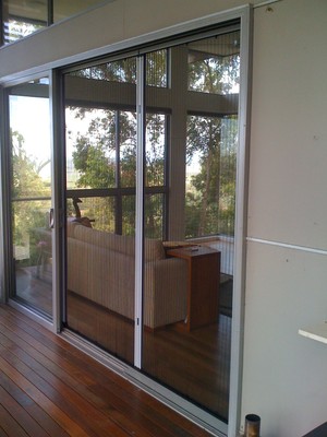 True Value Screens Pic 3 - Retractable fly screen for stacker doors