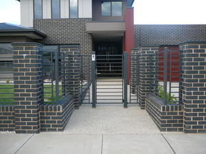 Central Gippsland Fencing Pic 2 - Tubular steel gates and panels between brick pillars