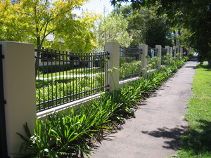 Pride Fencing. Pic 3 - decorative metal panels over rendered painted brick pilons