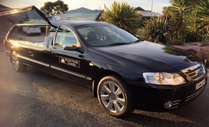 Lincoln Family Funerals Pic 5 - Lincoln Family Funerals offers a black and silver modern hearse