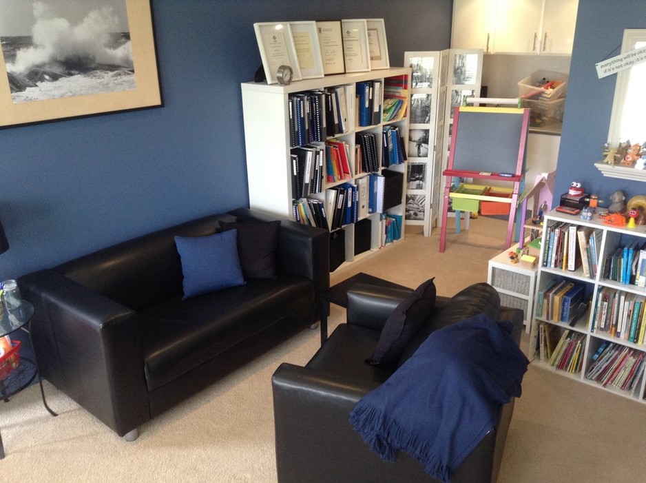 Natalie Fisher Counselling Pic 1 - Consulting room offers space to chat for adults and a corner for children with dollhouses and play therapy activities