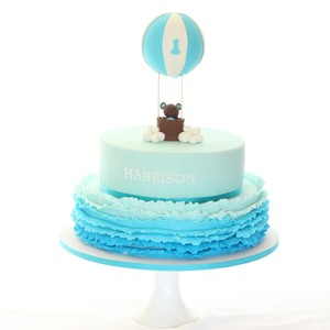 Sweet White Box Pic 4 - 2 tier bear and hot air balloon Christening cake with ruffles