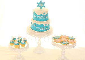 Sweet White Box Pic 3 - 2 tier Frozen snowflake themed cake with matching cookies and cupcakes