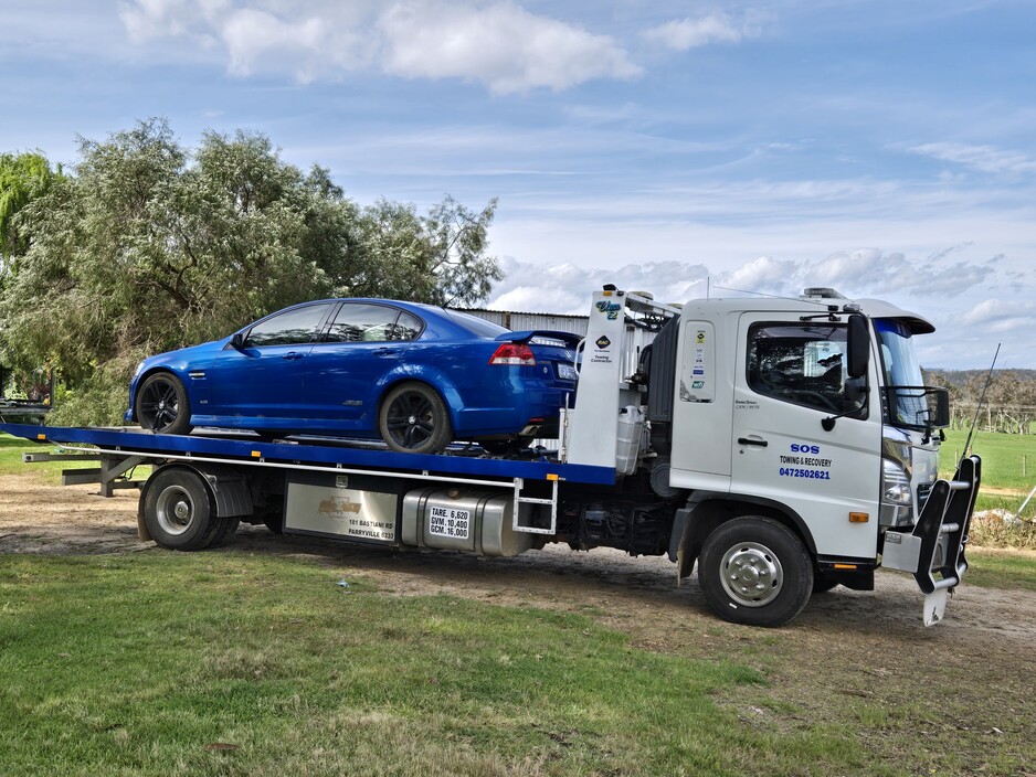 SOS Towing & Recovery Pic 1 - Experience towing and handling sports cars