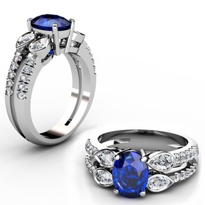 Waldermar Jewellers Pic 5 - No tears today Beautiful Ring with Blue Ceylon Sapphire surrounded by four Pearshaped Diamonds