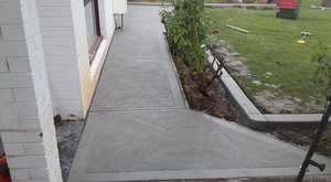 All-ways Kerb Pic 4 - Swirl finish and picture framed path with garden kerb