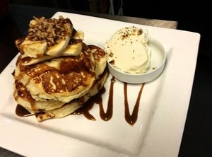 Sned's Lakeview Cafe Pic 3 - Treat yourself at Sneds Lakeview Cafe with our delicious buttermilk Pancakes with fresh Banana Roasted Walnuts Vanilla Icecream Butterscotch sauce yum