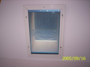 Pet Doors Installed Pic 3 - dog door fitted into a brick wall