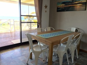 Fareview Beach House Pic 3 - Dining room overlooking the bay