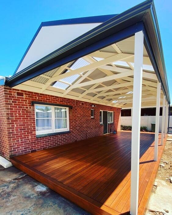 Superb Pergolas N Decks Pic 1 - A beautifully crafted outdoor space with a spacious timber deck that blends seamlessly with the natural surroundings showcasing the premium decking craftsmanship of Superb Pergolas N Decks in Adelaide