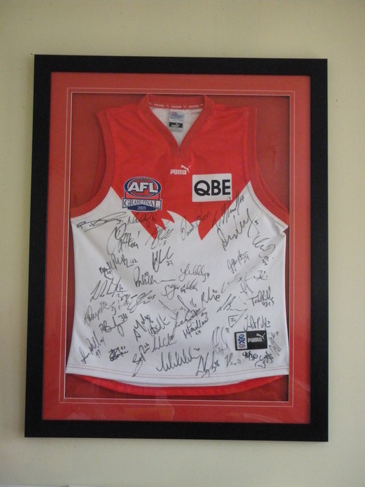 ALL CUSTOM PICTURE FRAMES Pic 1 - Sydney Swans Signed Jumper