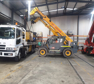 Freesons Telehandler Hire Pic 2 - Twin Telehandler lift with rhino hook attachments