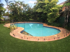 Clearsafe glass pool fencing Brisbane Pic 3 - Frameless glass to shaped pool