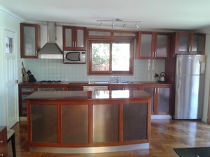 Tony Dib Cabinets Pic 3 - Solid Jarrah tops with metallic laminate inserts to doors