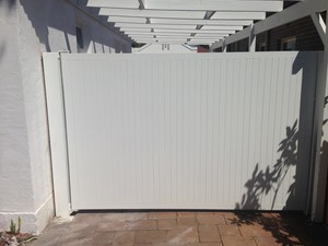 Australian Auto Gates Pic 5 - Automatic Swing Gates installed at Randwick design is vertical metal slats without spacing between them to ensure full privacy