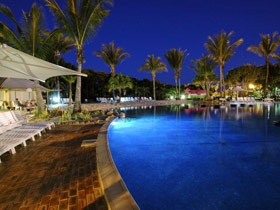 Rydges Capricorn Resort Pic 1 - Rydges Capricorn Resort Beach Pool by Night