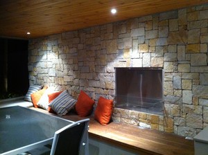 Bloom Landscapes Pic 3 - Glenhaven Ecosmart fireplace storage boxes with feature stone wall