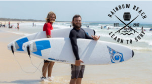 Rainbow Beach Learn to Surf Pic 3 - Hire a surfboard right on the beach Rainbow Beach